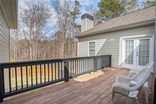 wooden deck featuring french doors