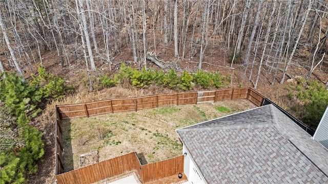 view of yard with a fenced backyard