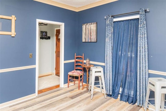 office with ornamental molding and wood-type flooring