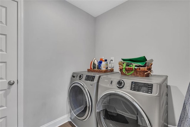 washroom featuring separate washer and dryer