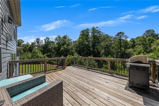 wooden terrace with area for grilling