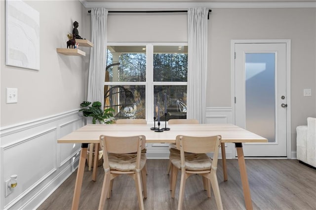 dining area with hardwood / wood-style floors