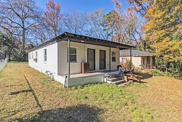 manufactured / mobile home with a porch and a front yard