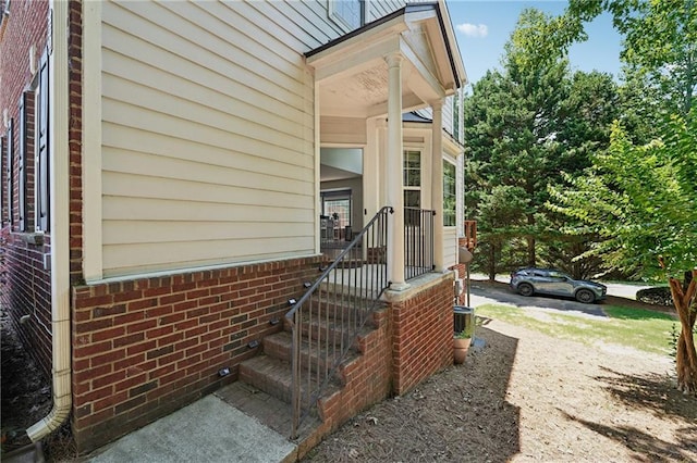 350 Eagle Tiff Dr, Sugar Hill, GA 30518 - view of exterior entry featuring brick siding