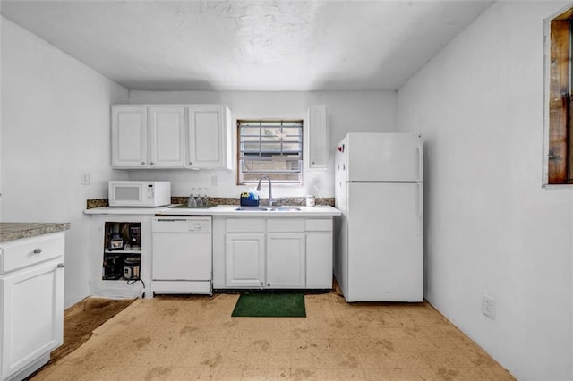 14300 Veterans Memorial Hwy, Villa Rica, GA 30180 - kitchen with white appliances, a sink, white cabinetry, and light countertops