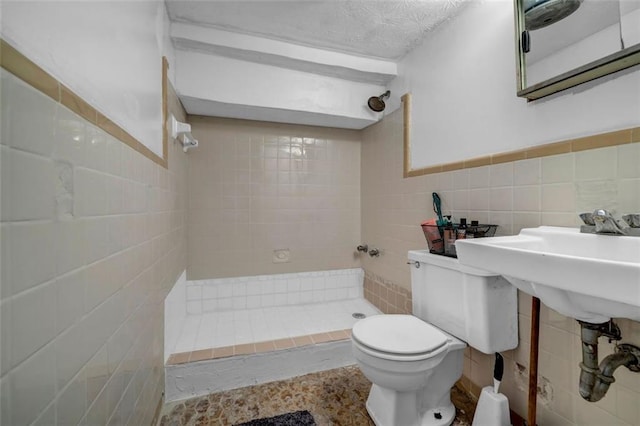 14300 Veterans Memorial Hwy, Villa Rica, GA 30180 - full bath featuring a stall shower, tile walls, and toilet