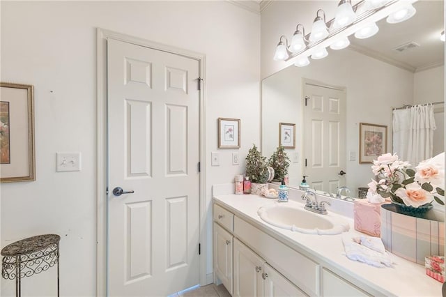 bathroom with vanity, ornamental molding, and walk in shower