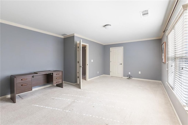 unfurnished bedroom with light colored carpet and crown molding