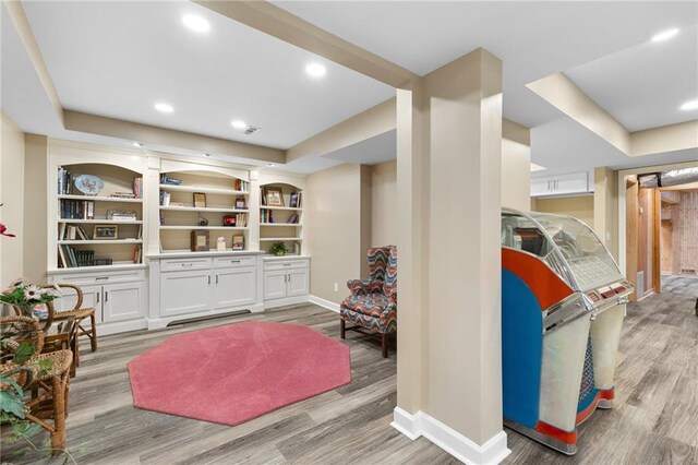 living area featuring light hardwood / wood-style floors