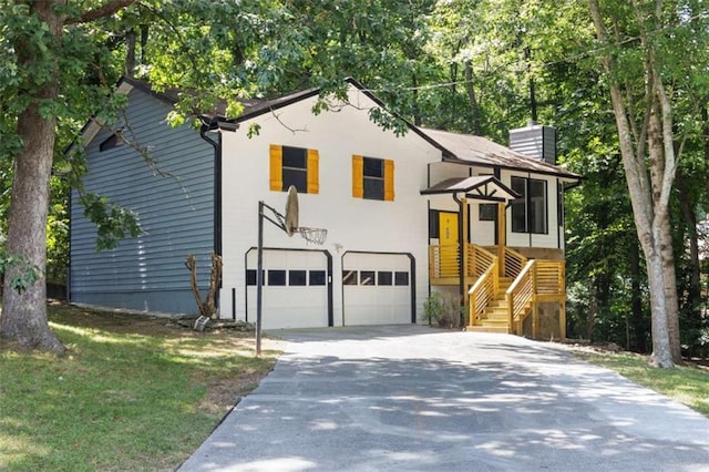 view of front of property with a garage