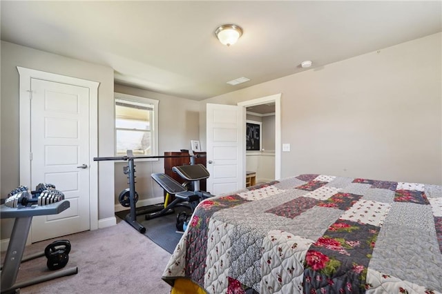 bedroom with light colored carpet