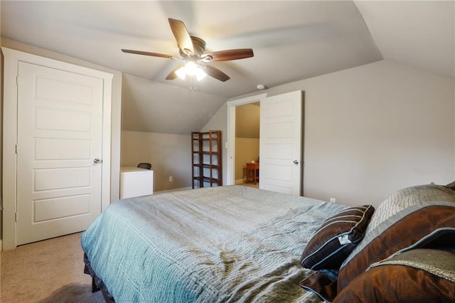 carpeted bedroom featuring ceiling fan and lofted ceiling