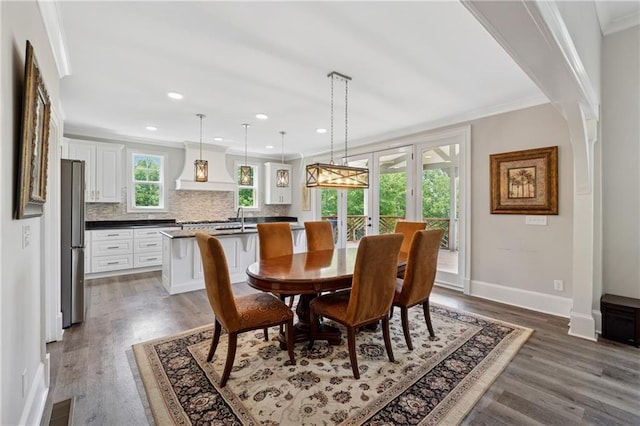 1656 Talking Rock Rd, Jasper, GA 30143 - dining space with french doors, wood finished floors, crown molding, recessed lighting, and baseboards