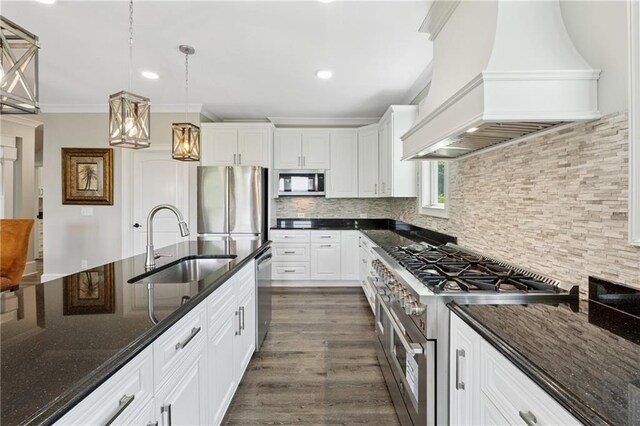 1656 Talking Rock Rd, Jasper, GA 30143 - kitchen with premium range hood, appliances with stainless steel finishes, a sink, white cabinets, and tasteful backsplash