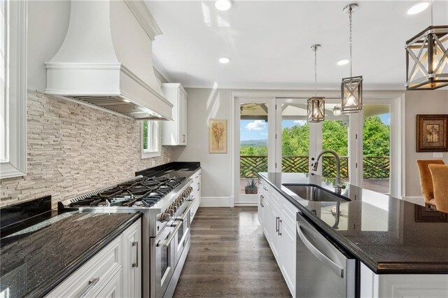 1656 Talking Rock Rd, Jasper, GA 30143 - kitchen with a sink, premium range hood, stainless steel appliances, backsplash, and a center island with sink