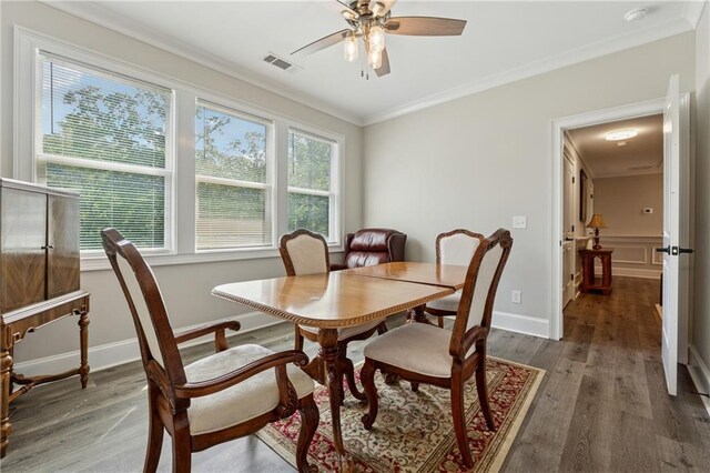 1656 Talking Rock Rd, Jasper, GA 30143 - dining space featuring ceiling fan, wood finished floors, crown molding, and baseboards
