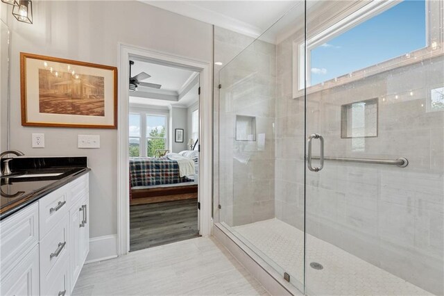 1656 Talking Rock Rd, Jasper, GA 30143 - bathroom with ensuite bathroom, crown molding, a stall shower, vanity, and baseboards