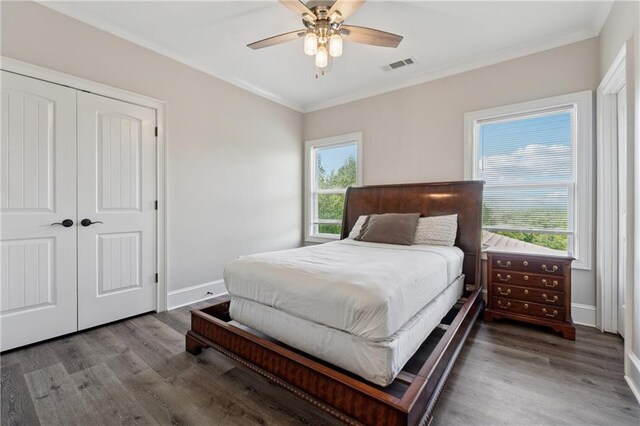 1656 Talking Rock Rd, Jasper, GA 30143 - bedroom featuring wood finished floors, crown molding, a closet, baseboards, and ceiling fan
