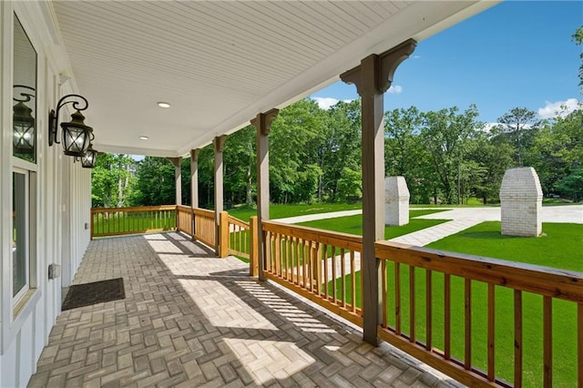1656 Talking Rock Rd, Jasper, GA 30143 - deck featuring covered porch, a yard, and view of scattered trees