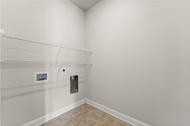 427 Dawson Pointe Pkwy, Dawsonville, GA 30534 - laundry room with hookup for an electric dryer, baseboards, hookup for a washing machine, and tile patterned flooring