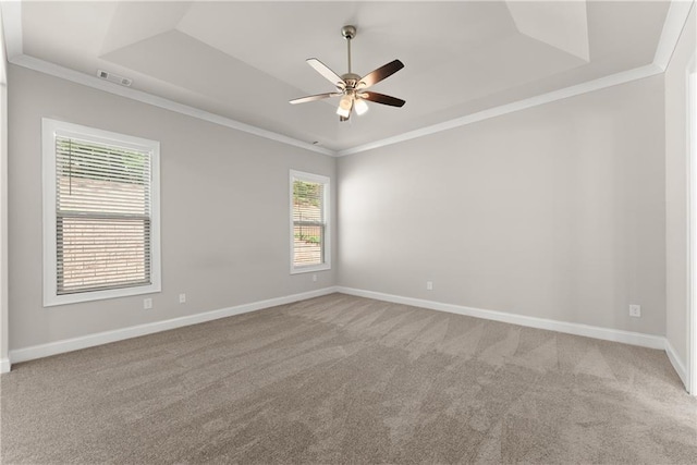 427 Dawson Pointe Pkwy, Dawsonville, GA 30534 - unfurnished room featuring a raised ceiling, a ceiling fan, carpet floors, and crown molding