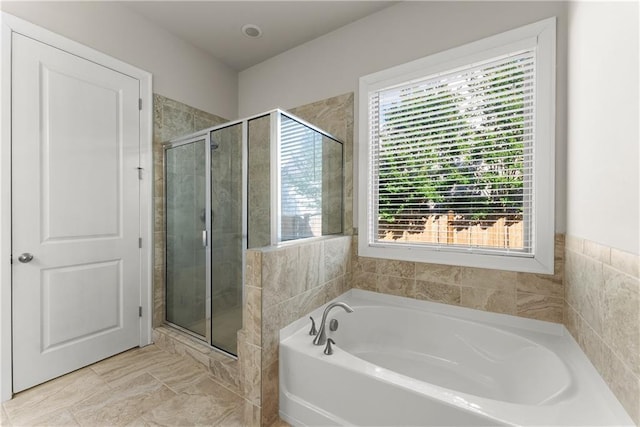 427 Dawson Pointe Pkwy, Dawsonville, GA 30534 - bathroom with plenty of natural light, a stall shower, and a bath