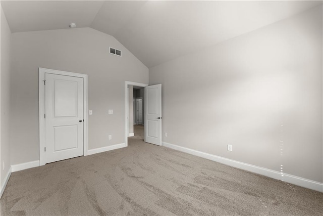 427 Dawson Pointe Pkwy, Dawsonville, GA 30534 - unfurnished bedroom with carpet, baseboards, and high vaulted ceiling