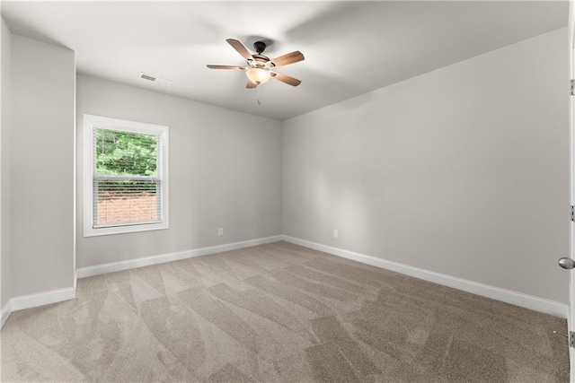 427 Dawson Pointe Pkwy, Dawsonville, GA 30534 - empty room with a ceiling fan, light carpet, and baseboards