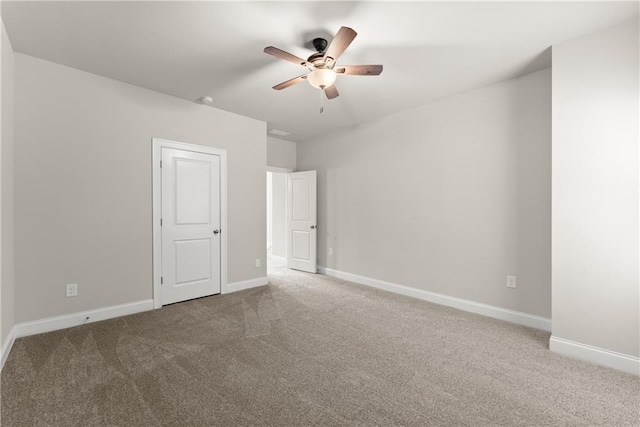 427 Dawson Pointe Pkwy, Dawsonville, GA 30534 - unfurnished bedroom with carpet floors, baseboards, and a ceiling fan