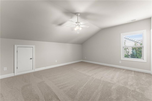 427 Dawson Pointe Pkwy, Dawsonville, GA 30534 - additional living space featuring ceiling fan, lofted ceiling, light carpet, and baseboards