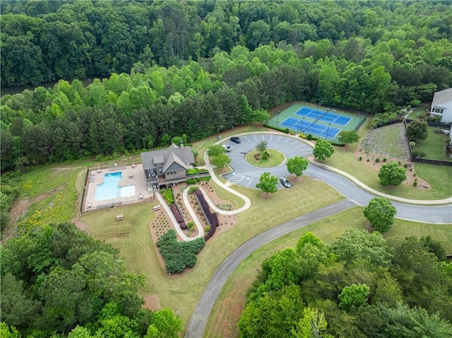 427 Dawson Pointe Pkwy, Dawsonville, GA 30534 - bird's eye view of a pool area and a heavily wooded area