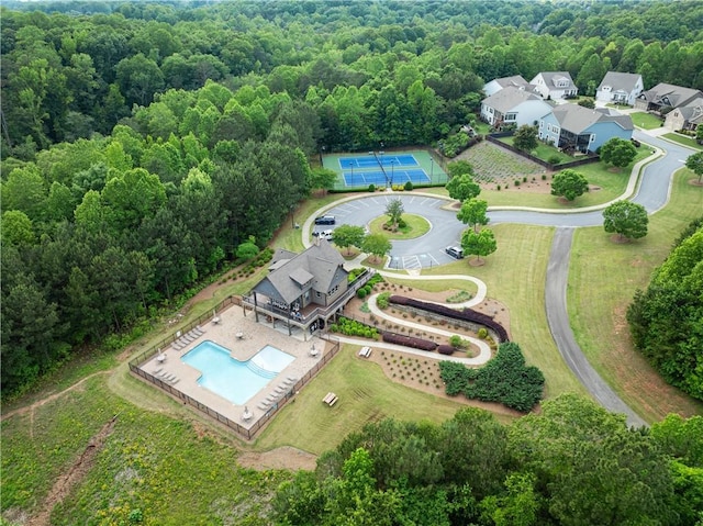 427 Dawson Pointe Pkwy, Dawsonville, GA 30534 - drone / aerial view of a pool area and a heavily wooded area