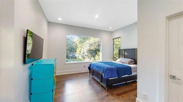 bedroom featuring recessed lighting, baseboards, and wood finished floors