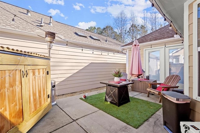 view of patio / terrace featuring a fire pit