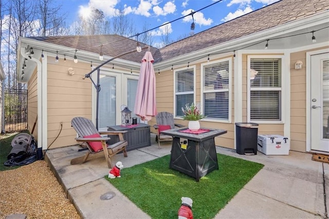 view of patio / terrace with a fire pit