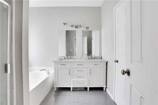 2005 Chicago Ave NW, Atlanta, GA 30314 - bathroom featuring double vanity, a bath, and tile patterned flooring