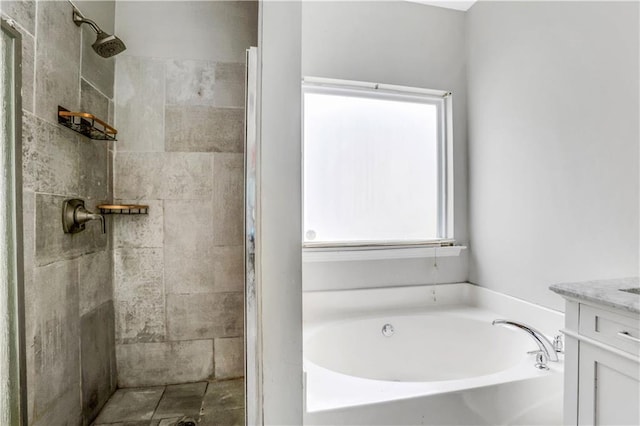 2005 Chicago Ave NW, Atlanta, GA 30314 - full bath featuring a garden tub, vanity, and a tile shower