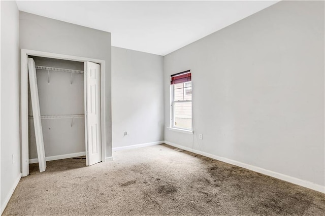 2005 Chicago Ave NW, Atlanta, GA 30314 - unfurnished bedroom featuring carpet floors and a closet