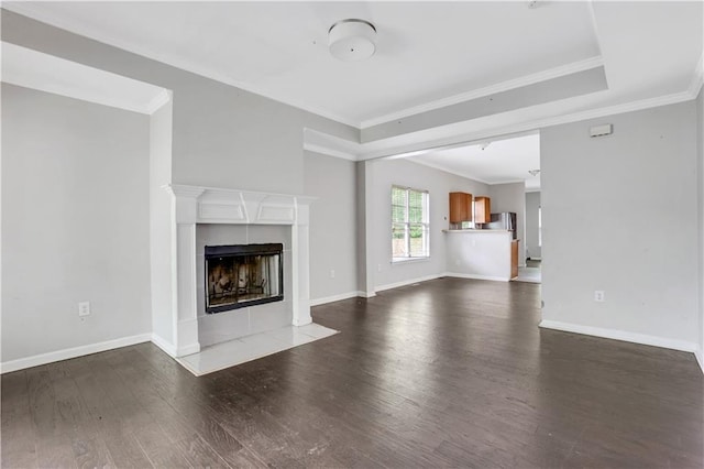 2005 Chicago Ave NW, Atlanta, GA 30314 - unfurnished living room with wood finished floors, a tile fireplace, and crown molding
