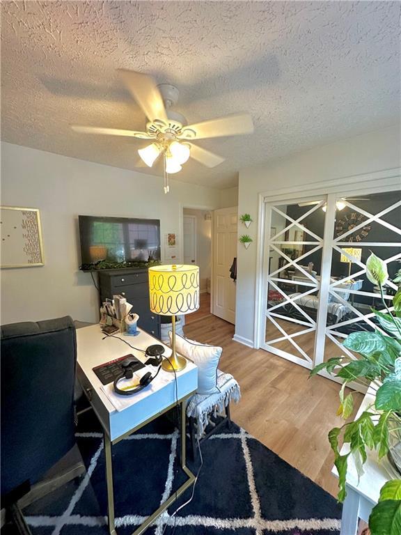 227 Bennett Farms Trl, Acworth, GA 30102 - office space featuring a textured ceiling, wood finished floors, and ceiling fan
