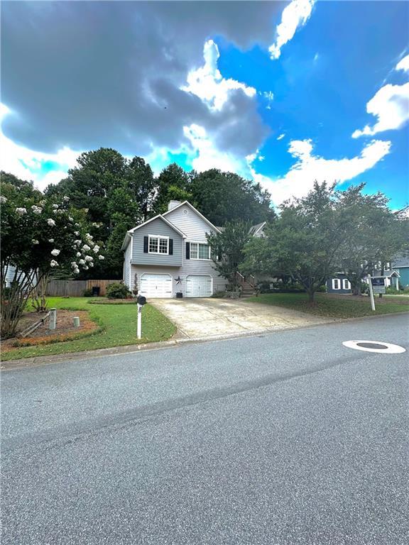 227 Bennett Farms Trl, Acworth, GA 30102 - view of front of property with a garage and concrete driveway
