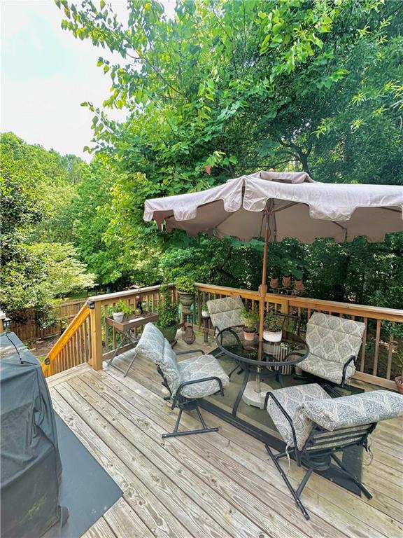 227 Bennett Farms Trl, Acworth, GA 30102 - wooden deck featuring outdoor dining area