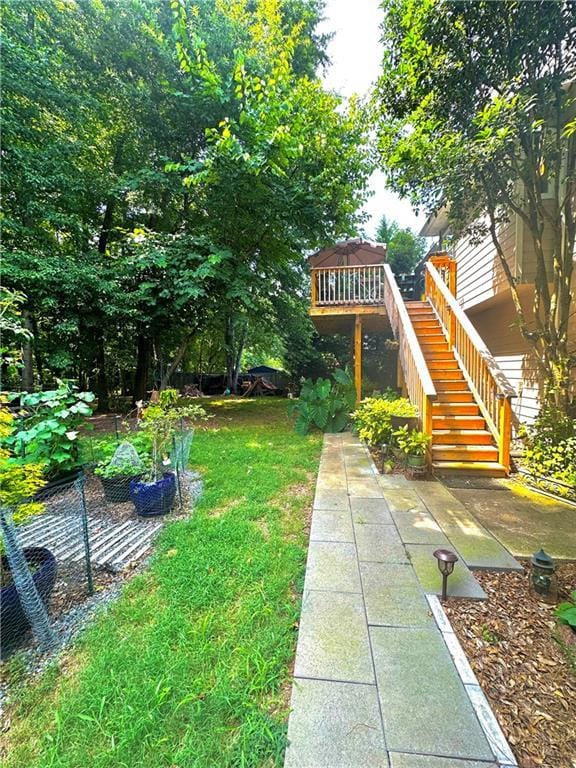227 Bennett Farms Trl, Acworth, GA 30102 - view of green lawn with stairway and a deck