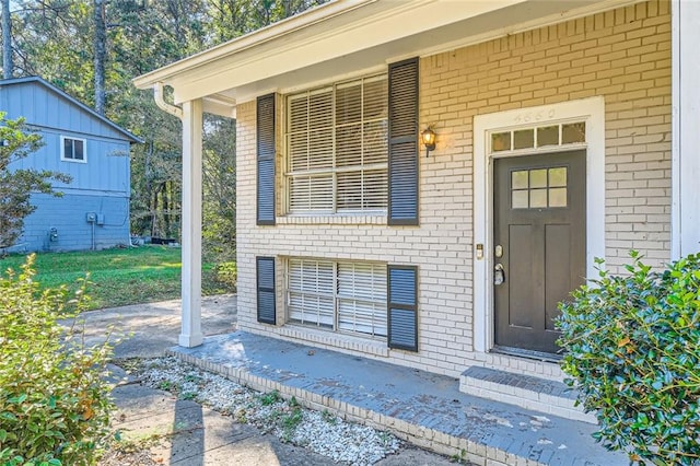 entrance to property with a porch