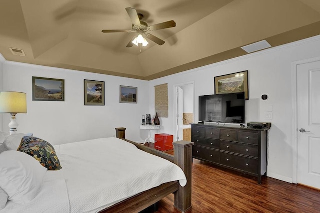 2295 Hemrick Rd, Cumming, GA 30041 - bedroom with a tray ceiling, dark wood-style flooring, and a ceiling fan