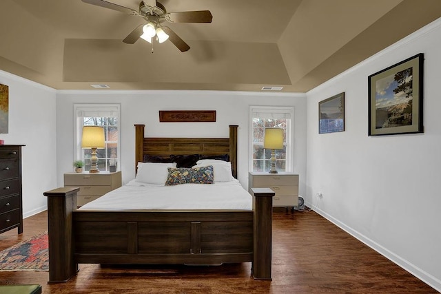 2295 Hemrick Rd, Cumming, GA 30041 - bedroom with a raised ceiling, dark wood-style flooring, baseboards, and ceiling fan
