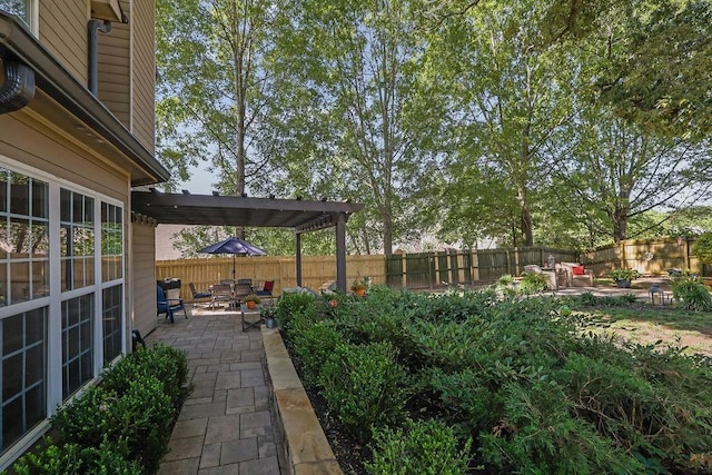 2295 Hemrick Rd, Cumming, GA 30041 - fenced backyard with a patio and a pergola