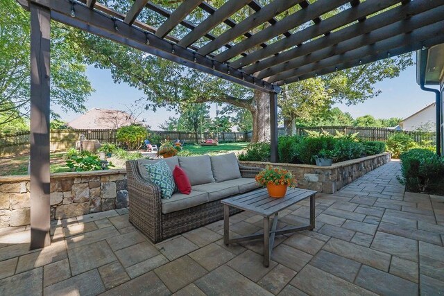2295 Hemrick Rd, Cumming, GA 30041 - fenced backyard with a patio and an outdoor living space