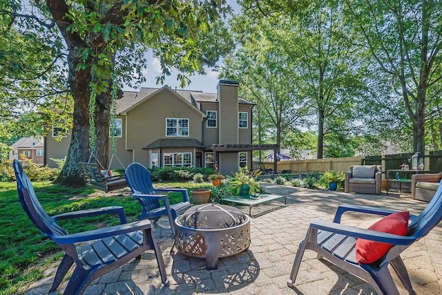 2295 Hemrick Rd, Cumming, GA 30041 - view of patio with an outdoor fire pit