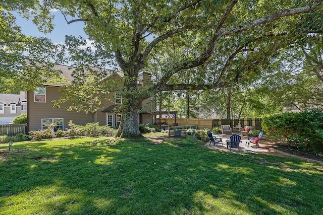 2295 Hemrick Rd, Cumming, GA 30041 - view of yard featuring a patio area and an outdoor fire pit